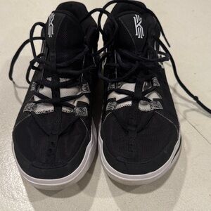 Black and White Nike Kyrie Irving basketball shoes